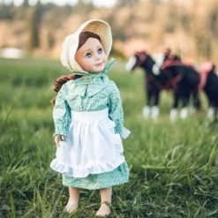 The Queen's Treasures 18 Inch Green Calico Prairie Dress, Apron, And Bonnet -Dolls Discount Store GUEST 8b14a722 3a8e 4a6f 8306 fed43485989b